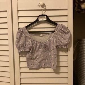 Cute cropped top. Purple with little daises on it. Size- 13-14 yr!
